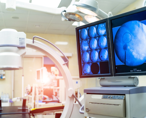 Medical-devices-for-ultrasound-examination-on-a-background-of-the-screen-495x400